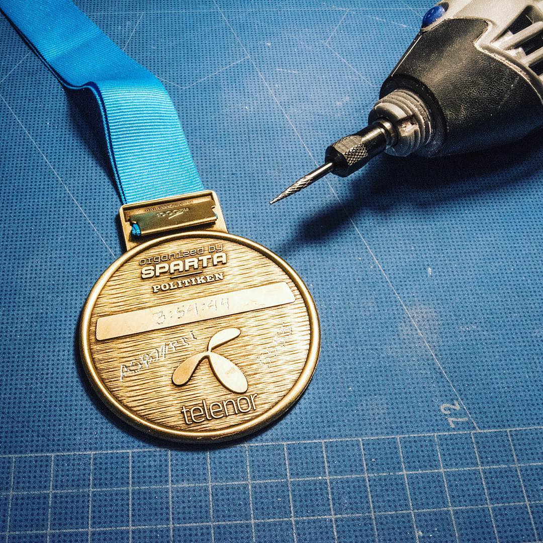 Borrowed a dremel from the other half of @urbanbearstudio to engrave my finish time on the medal fro